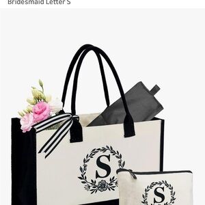 Elegant Black and White Tote Bag with Initial Design